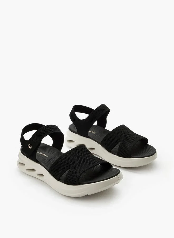 لو كونفورت صنادل نسائية بكعب منصة وحزام